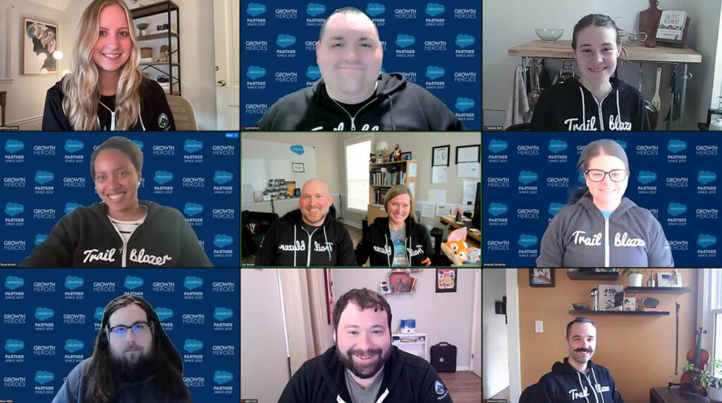 Zoom screenshot of 10 people smiling in trailblazer hoodies