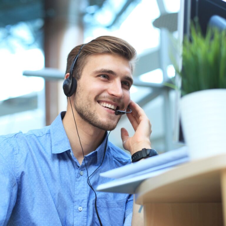 Man talking on headset.