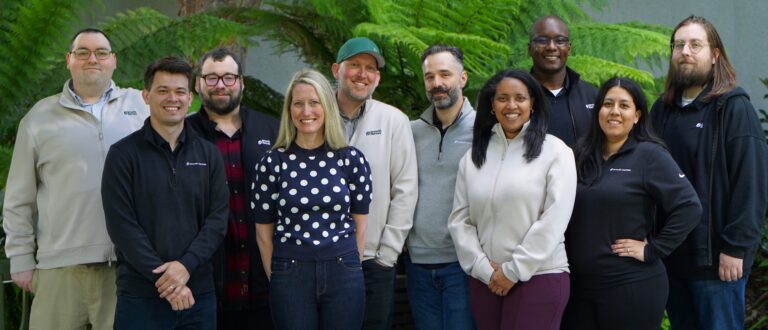 Outdoor picture of the entire Growth Heroes team of Salesforce experts.