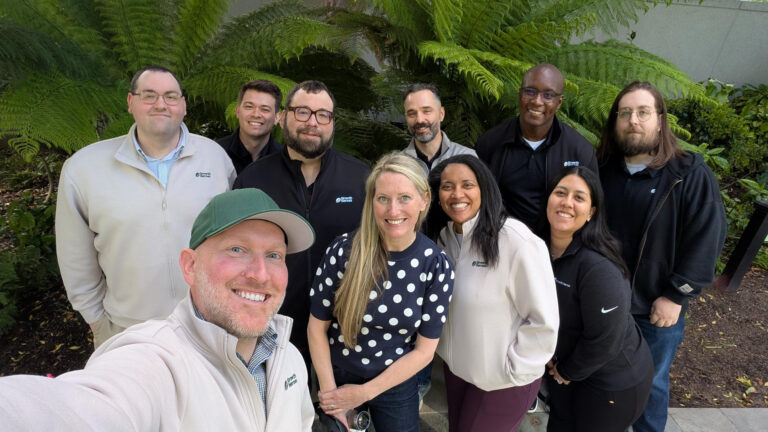 Group selfie of the Growth Heroes team taken outdoors
